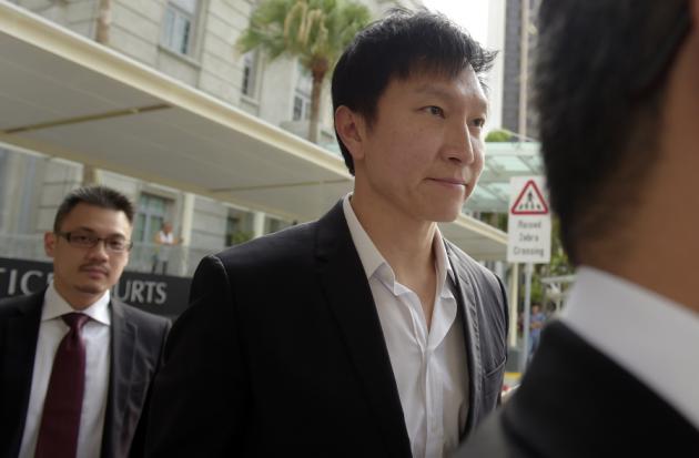 City Harvest Church founder Kong Hee arrives at court for his sentencing hearing Friday, Nov. 20, 2015 in Singapore. The founder of the popular Singapore church was found guilty Wednesday, Oct. 21, 2015, of misappropriating about $35 million in donations to support his wife's singing career in Asia before helping her break into the U.S. market for evangelization purposes. (AP Photo/Joseph Nair)